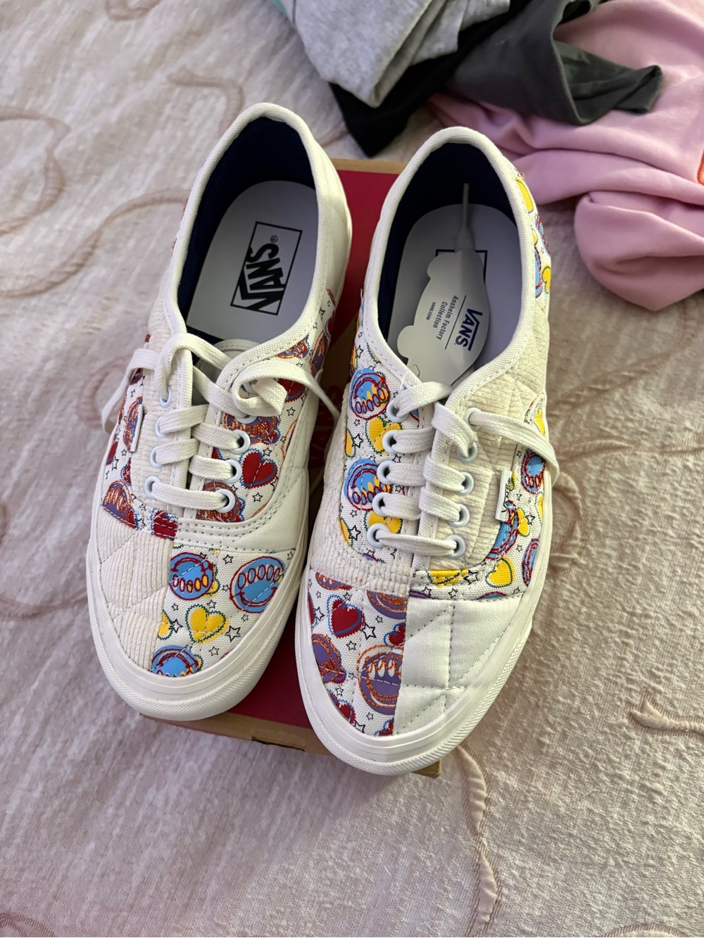 Vans White Low-Top Sneakers with Red, Yellow, Blue & Purple Heart Print